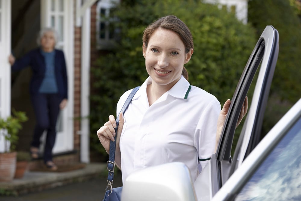 RS7894_sy_female_care_worker_visiting_senior_woman_cl_A46779388_clean_2017